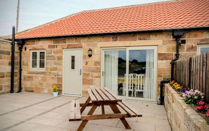 The exterior of Cart Wheel Cottage at Broadings Farm, near Whitby